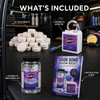 Collection of OdorBlitz products including tablets, aeroator, treatment kit, and instruction guide on a dark surface.